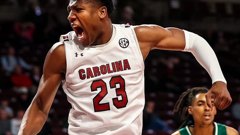 Dec 30, 2022; Columbia, South Carolina, USA; South Carolina Gamecocks forward Gregory Jackson II (23) reacts after dunking against the Eastern Michigan Eagles in the first half at Colonial Life Arena. Mandatory Credit: Jeff Blake-USA TODAY Sports