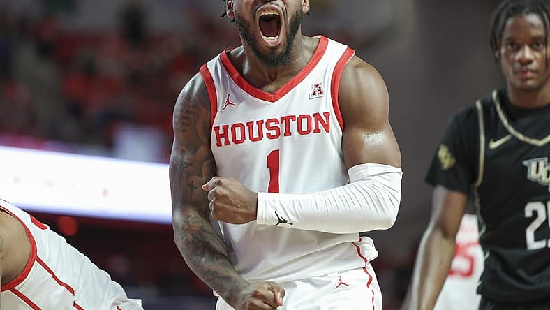 Dec 31, 2022; Houston, Texas, USA; Houston Cougars guard Jamal Shead (1) reacts after a play during the second half against the Central Florida Knights at Fertitta Center. Mandatory Credit: Troy Taormina-USA TODAY Sports