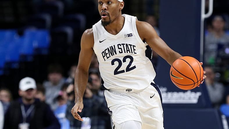 Jan 1, 2023; University Park, Pennsylvania, USA; Penn State Nittany Lions guard Jalen Pickett (22) dribbles the ball during the first half against the Iowa Hawkeyes at Bryce Jordan Center. Mandatory Credit: Matthew OHaren-USA TODAY Sports