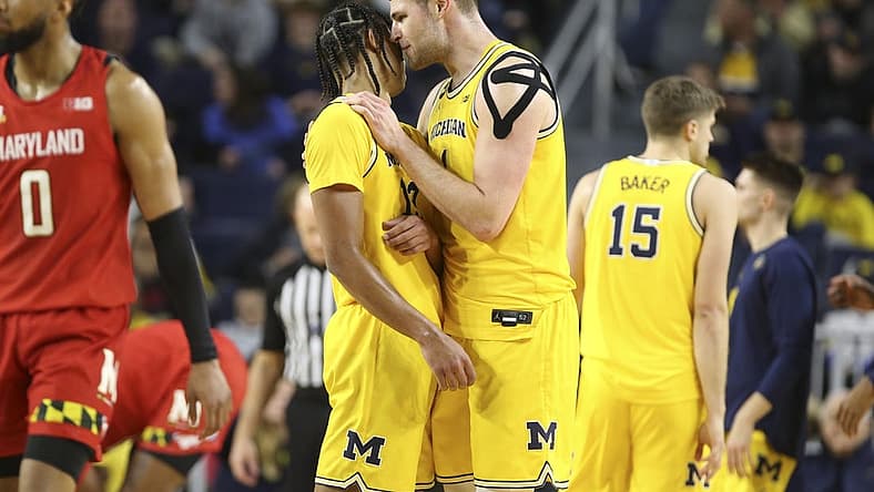 Jan 1, 2023; Ann Arbor, Michigan, USA; Michigan Wolverines center Hunter Dickinson (1) talks with guard Jett Howard (13) during the second half of the game against the Maryland Terrapins at Crisler Center. Mandatory Credit: Brian Bradshaw Sevald-USA TODAY Sports