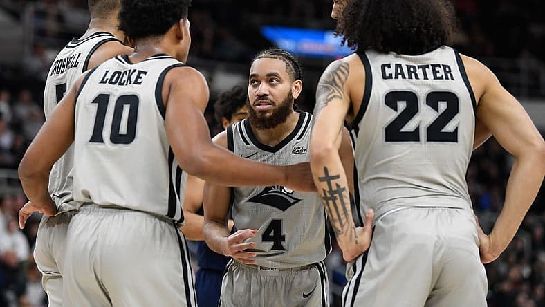 Dec 20, 2022; Providence, Rhode Island, USA; Providence Friars guard Jared Bynum (4) huddles the team during the first half against the Marquette Golden Eagles at Amica Mutual Pavilion. Mandatory Credit: Eric Canha-USA TODAY Sports