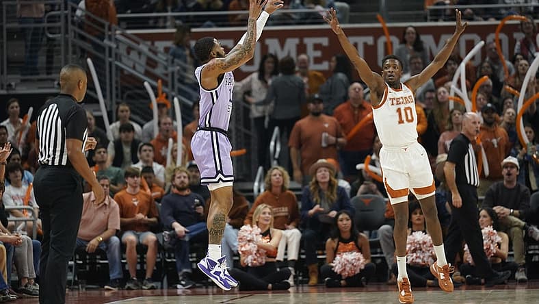 Jan 3, 2023; Austin, Texas, USA; Kansas State Wildcats guard Desi Sills (13) shoots over Texas Longhorns guard Sir'Jabari Rice (10) during the first half at Moody Center. Mandatory Credit: Scott Wachter-USA TODAY Sports