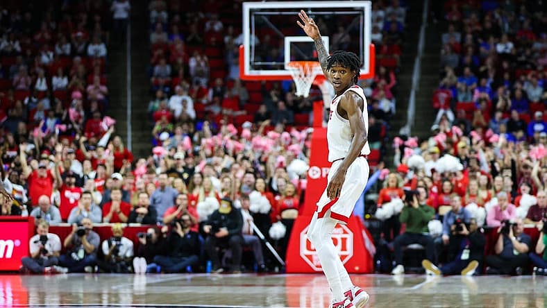 Jan 4, 2023; Raleigh, North Carolina, USA;
North Carolina State Wolfpack guard Terquavion Smith (0) celebrates a thee pointer during the first half against Duke Blue Devils at PNC Arena. Mandatory Credit: Jaylynn Nash-USA TODAY Sports