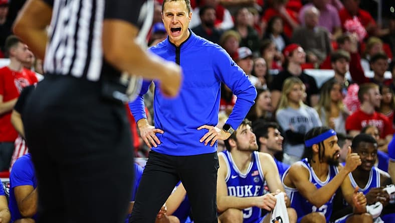 Jan 4, 2023; Raleigh, North Carolina, USA; Duke Blue Devils coach Jon Scheyer shouts at the referee during the second half against North Carolina State Wolfpack at PNC Arena. Mandatory Credit: Jaylynn Nash-USA TODAY Sports