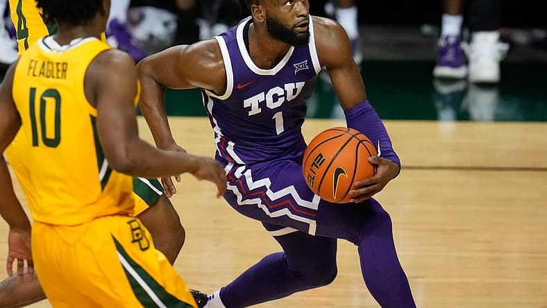 Jan 4, 2023; Waco, Texas, USA; TCU Horned Frogs guard Mike Miles Jr. (1) drives to the basket against Baylor Bears guard Adam Flagler (10) during the second half at Ferrell Center. Mandatory Credit: Chris Jones-USA TODAY Sports