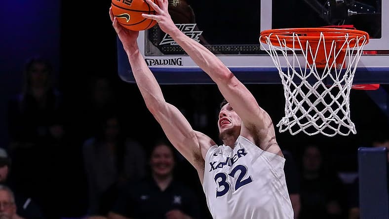 Dec 20, 2022; Cincinnati, Ohio, USA; Xavier Musketeers forward Zach Freemantle (32) grabs the rebound against the Seton Hall Pirates in the first half at Cintas Center. Mandatory Credit: Katie Stratman-USA TODAY Sports