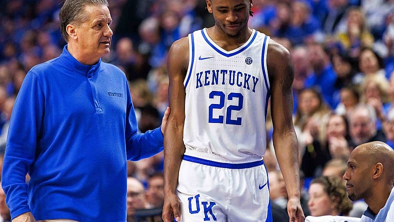 Dec 31, 2022; Lexington, Kentucky, USA; Kentucky Wildcats head coach John Calipari talks with guard Cason Wallace (22) during the second half against the Louisville Cardinals at Rupp Arena at Central Bank Center. Mandatory Credit: Jordan Prather-USA TODAY Sports