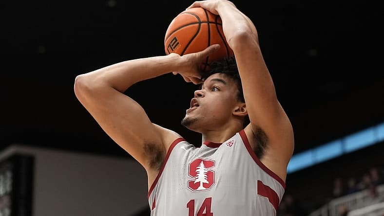 Dec 31, 2022; Stanford, California, USA; Stanford Cardinal forward Spencer Jones (14) shoots against the Utah Utes during the first half at Maples Pavilion. Mandatory Credit: Darren Yamashita-USA TODAY Sports