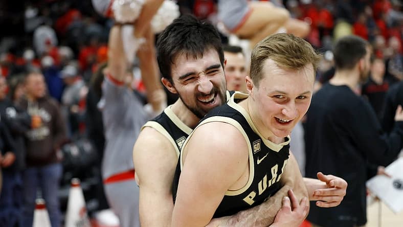 Jan 5, 2023; Columbus, Ohio, USA;  Purdue Boilermakers guard Ethan Morton (left) and guard Fletcher Loyer (right) celebrate the win against the Ohio State Buckeyes at Value City Arena. Mandatory Credit: Joseph Maiorana-USA TODAY Sports