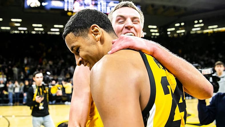 Iowa forward Payton Sandfort, right, embraces teammate Kris Murray after a NCAA Big Ten Conference men's basketball game against Indiana, Thursday, Jan. 5, 2023, at Carver-Hawkeye Arena in Iowa City, Iowa.
230105 Indiana Iowa Mbb 043 Jpg