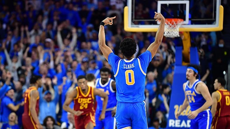 Jan 5, 2023; Los Angeles, California, USA; UCLA Bruins guard Jaylen Clark (0) celebrates his three point basket scored against the Southern California Trojans during the second half at Pauley Pavilion. Mandatory Credit: Gary A. Vasquez-USA TODAY Sports