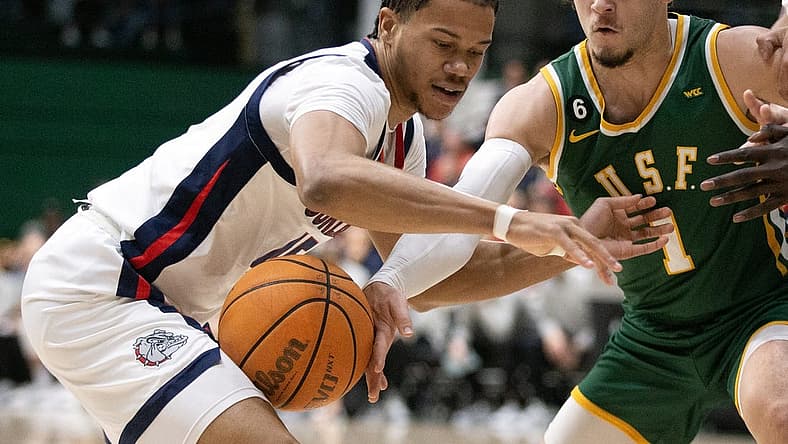 Jan 5, 2023; San Francisco, California, USA; Gonzaga Bulldogs guard Rasir Bolton (45) loses the ball to San Francisco Dons guard Tyrell Roberts (1) during the first half at War Memorial at the Sobrato Center. Mandatory Credit: D. Ross Cameron-USA TODAY Sports