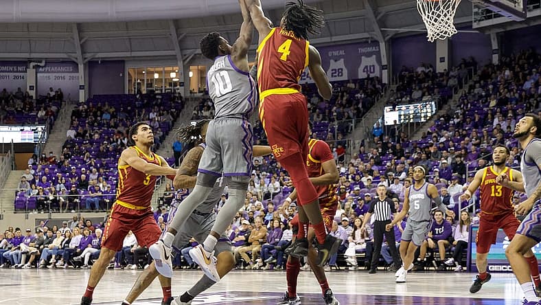 Jan 7, 2023; Fort Worth, Texas, USA; Iowa State Cyclones guard Demarion Watson (4) blocks a shot by TCU Horned Frogs guard Damion Baugh (10) during the first half at Ed and Rae Schollmaier Arena. Mandatory Credit: Andrew Dieb-USA TODAY Sports