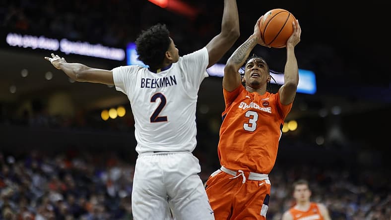 Jan 7, 2023; Charlottesville, Virginia, USA; Syracuse Orange guard Judah Mintz (3) shoots the ball as Virginia Cavaliers guard Reece Beekman (2) defends in the first halfat John Paul Jones Arena. Mandatory Credit: Geoff Burke-USA TODAY Sports