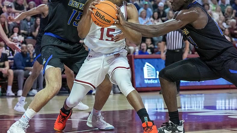 Jan 7, 2023; Charleston, South Carolina, USA; Charleston Cougars guard Pat Robinson III (15) looks for an outlet in the first half against the Delaware Fightin Blue Hens at TD Arena. Mandatory Credit: David Yeazell-USA TODAY Sports