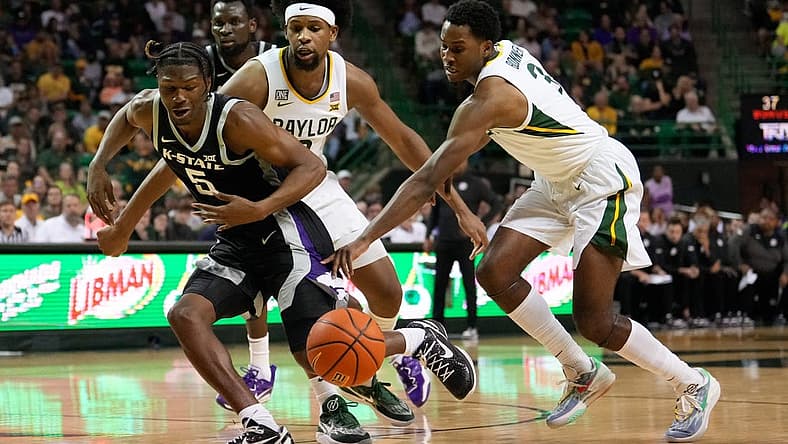 Jan 7, 2023; Waco, Texas, USA; Baylor Bears guard Dale Bonner (3) steals the ball from Kansas State Wildcats guard Cam Carter (5) during the first half at Ferrell Center. Mandatory Credit: Chris Jones-USA TODAY Sports