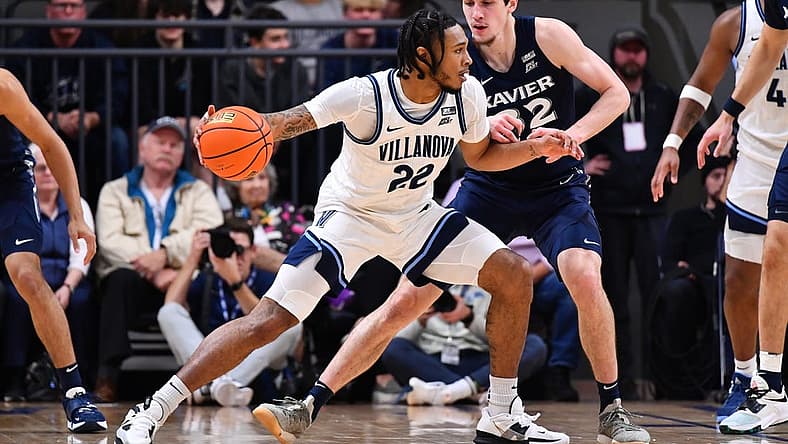 Jan 7, 2023; Villanova, Pennsylvania, USA; Villanova Wildcats forward Cam Whitmore (22) controls the ball against Xavier Musketeers forward Zach Freemantle (32) in the second half at William B. Finneran Pavilion. Mandatory Credit: Kyle Ross-USA TODAY Sports