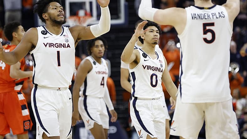 Jan 7, 2023; Charlottesville, Virginia, USA; Virginia Cavaliers forward Jayden Gardner (1) celebrates with Cavaliers guard Kihei Clark (0) and Cavaliers forward Ben Vander Plas (5) against the Syracuse Orange in the second half at John Paul Jones Arena. Mandatory Credit: Geoff Burke-USA TODAY Sports