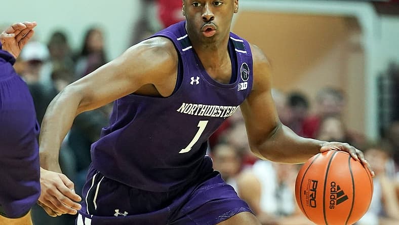 Jan 8, 2023; Bloomington, Indiana, USA; Northwestern Wildcats guard Chase Audige (1) dribbles the ball against the Indiana Hoosiers during the second half at Simon Skjodt Assembly Hall. Mandatory Credit: Robert Goddin-USA TODAY Sports