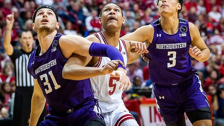 Indiana's Malik Reneau (5) battles with Northwestern's Robbie Baran (31) and Ty Berry (3) during the second half of the Indiana versus Northwestern men's basketball game at Simon Skjodt Assembly Hall on Sunday, Jan. 8, 2023.
Iu Nw Bb 2h Reneau 2