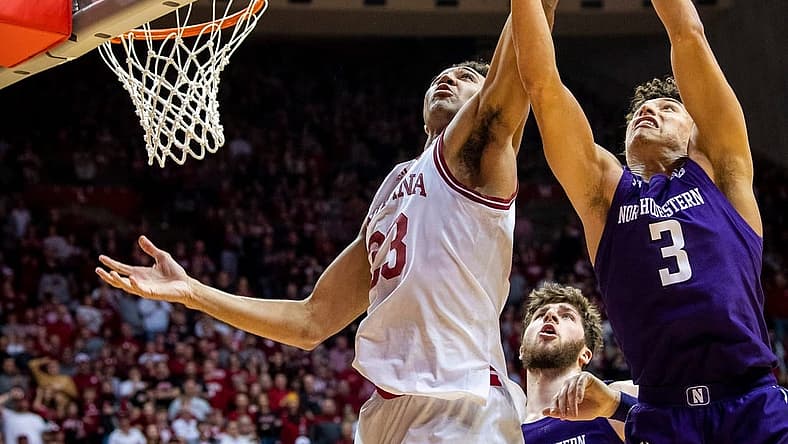 Indiana's Trayce Jackson-Davis (23) grabs a rebound from Northwestern's Ty Berry (3) during the second half of the Indiana versus Northwestern men's basketball game at Simon Skjodt Assembly Hall on Sunday, Jan. 8, 2023.

Iu Nw Bb 2h Tjd 1
