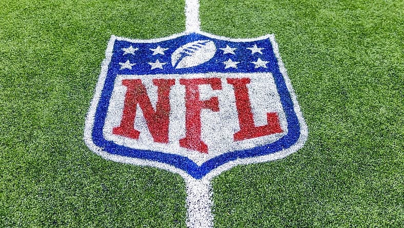 Jan 8, 2023; New Orleans, Louisiana, USA; Detailed view of the NFL shield logo on the field after the game between the New Orleans Saints and the Carolina Panthers at Caesars Superdome. Mandatory Credit: Stephen Lew-USA TODAY Sports