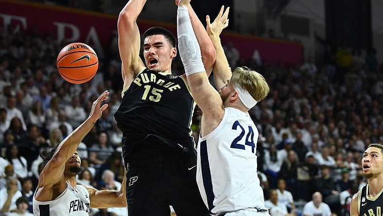 Jan 8, 2023; Philadelphia, Pennsylvania, USA; Purdue Boilermakers center Zach Edey (15) loses control of the ball against Penn State Nittany Lions forward Michael Henn (24) in the first half at The Palestra. Mandatory Credit: Kyle Ross-USA TODAY Sports