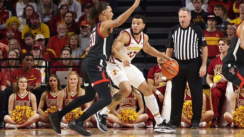 Jan 10, 2023; Ames, Iowa, USA; Texas Tech Red Raiders guard Jaylon Tyson (20) defends Iowa State Cyclones guard Jaren Holmes (13) at James H. Hilton Coliseum. Mandatory Credit: Reese Strickland-USA TODAY Sports