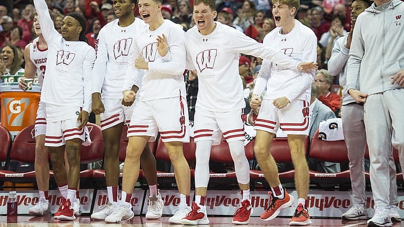 Jan 10, 2023; Madison, Wisconsin, USA;  The Wisconsin Badgers bench celebrates a three-pointer by Wisconsin Badgers forward Steven Crowl (not pictured) during the second half against the Michigan State Spartans at the Kohl Center. Mandatory Credit: Kayla Wolf-USA TODAY Sports