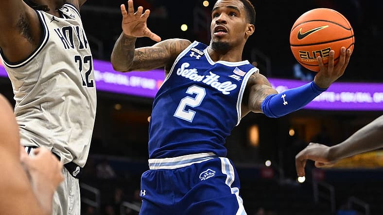 Jan 10, 2023; Washington, District of Columbia, USA; Seton Hall Pirates guard Al-Amir Dawes (2) shoots as Georgetown Hoyas forward Bradley Ezewiro (22) defends during the first half at Capital One Arena. Mandatory Credit: Brad Mills-USA TODAY Sports