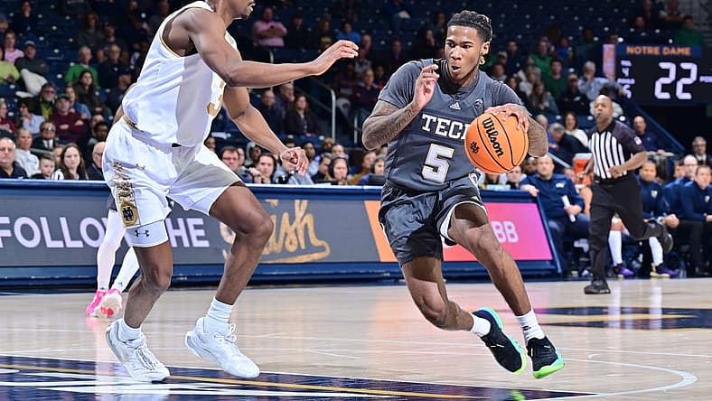 Jan 10, 2023; South Bend, Indiana, USA; Georgia Tech Yellow Jackets guard Deivon Smith (5) drives to the basket as Notre Dame Fighting Irish guard Trey Wertz (3) defends in the first half at the Purcell Pavilion. Mandatory Credit: Matt Cashore-USA TODAY Sports