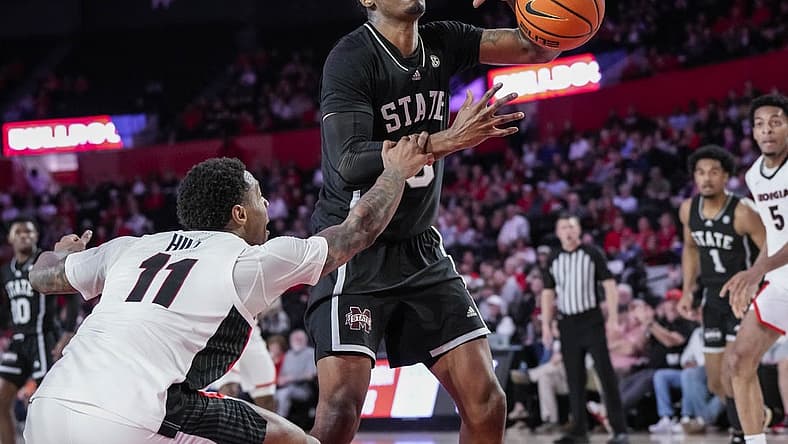Jan 11, 2023; Athens, Georgia, USA; Mississippi State Bulldogs forward D.J. Jeffries (0) is fouled by Georgia Bulldogs guard Justin Hill (11) during the first half at Stegeman Coliseum. Mandatory Credit: Dale Zanine-USA TODAY Sports