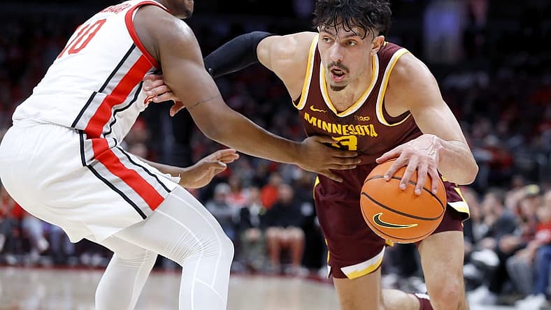 Jan 12, 2023; Columbus, Ohio, USA; Minnesota Golden Gophers forward Dawson Garcia (3) dribbles past Ohio State Buckeyes forward Brice Sensabaugh (10) during the first half at Value City Arena. Mandatory Credit: Joseph Maiorana-USA TODAY Sports