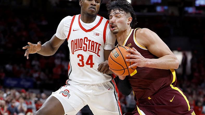 Jan 12, 2023; Columbus, Ohio, USA; Minnesota Golden Gophers forward Dawson Garcia (3) collides with Ohio State Buckeyes center Felix Okpara (34) during the first half at Value City Arena. Mandatory Credit: Joseph Maiorana-USA TODAY Sports