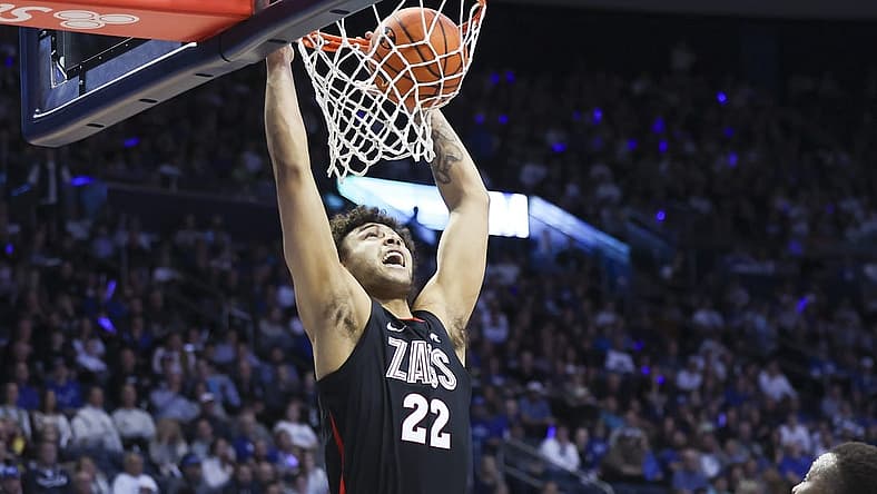 Jan 12, 2023; Provo, Utah, USA; Gonzaga Bulldogs forward Anton Watson (22) dunks the ball against the Brigham Young Cougars in the first half at Marriott Center. Mandatory Credit: Rob Gray-USA TODAY Sports