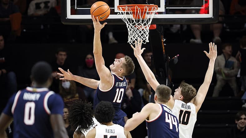 Jan 12, 2023; Corvallis, Oregon, USA; Arizona Wildcats forward Azuolas Tubelis (10) shoots the ball past Oregon State Beavers forward Tyler Bilodeau (10) during the first half at Gill Coliseum. Mandatory Credit: Soobum Im-USA TODAY Sports