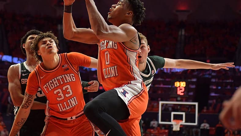 Jan 13, 2023; Champaign, Illinois, USA; Illinois Fighting Illini guard Terrence Shannon Jr. (0) drives to the basket during the first half against the Michigan State Spartans at State Farm Center. Mandatory Credit: Ron Johnson-USA TODAY Sports