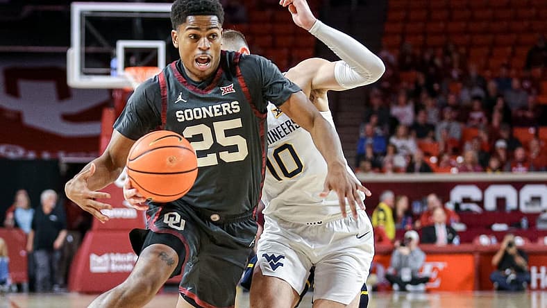 Oklahoma guard Grant Sherfield (25) drives to the hoop in the second half during a college basketball game between the Oklahoma Sooners (OU) and the West Virginia Mountaineers at Lloyd Noble Center in Norman, Okla., Saturday, Jan. 14, 2023.
Ou Vs West Virginia