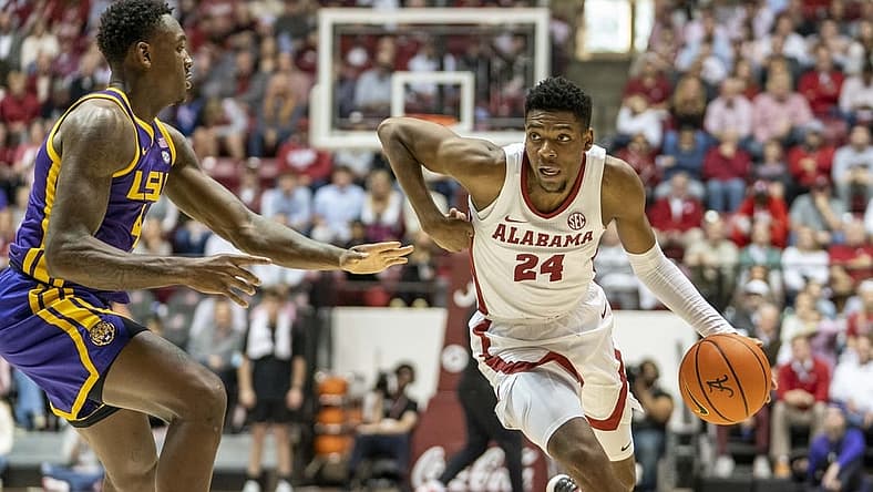 Jan 14, 2023; Tuscaloosa, Alabama, USA; Alabama Crimson Tide forward Brandon Miller (24) drives to the basket against LSU Tigers center Kendal Coleman (4) during the second half at Coleman Coliseum. Mandatory Credit: Marvin Gentry-USA TODAY Sports