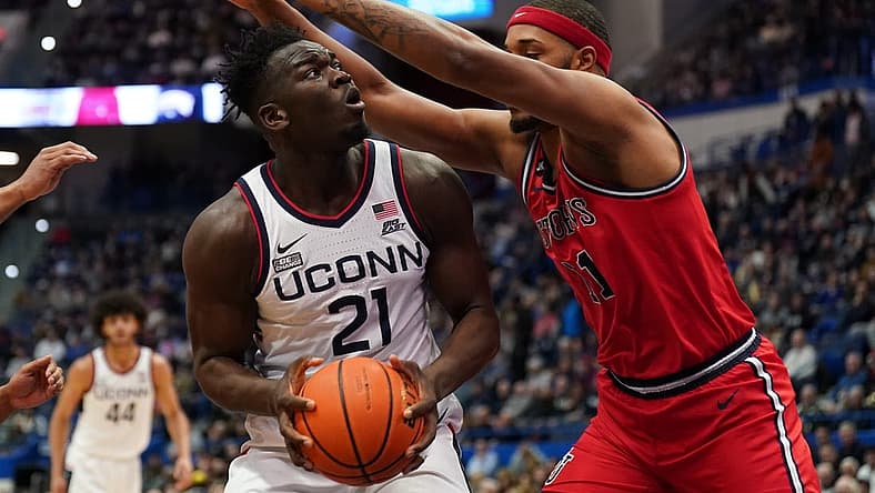 Jan 15, 2023; Hartford, Connecticut, USA; UConn Huskies forward Adama Sanogo (21) looks to shoot against St. John's Red Storm center Joel Soriano (11) in the first half at XL Center. Mandatory Credit: David Butler II-USA TODAY Sports