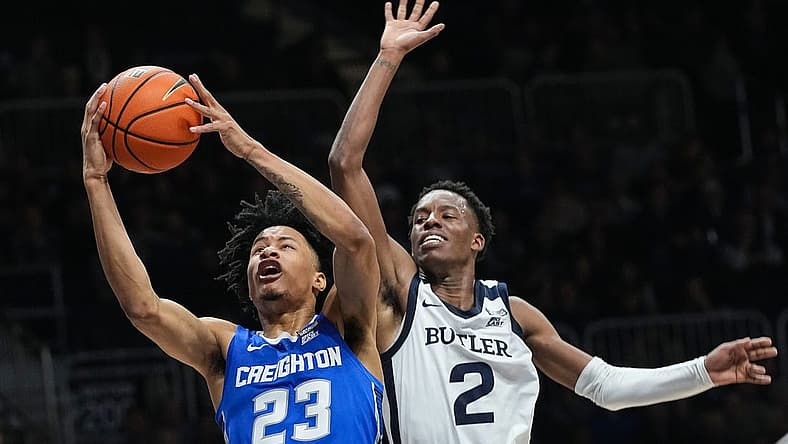 Creighton Bluejays guard Trey Alexander (23) reaches for a lay-up against Butler Bulldogs guard Eric Hunter Jr. (2) on Tuesday, Jan. 17, 2023 on Hinkle Fieldhouse in Indianapolis. Creighton Bluejays leads at the half against the Butler Bulldogs, 36-28.
Ncaa Basketball Ini Butler Basketball Vs Creighton
