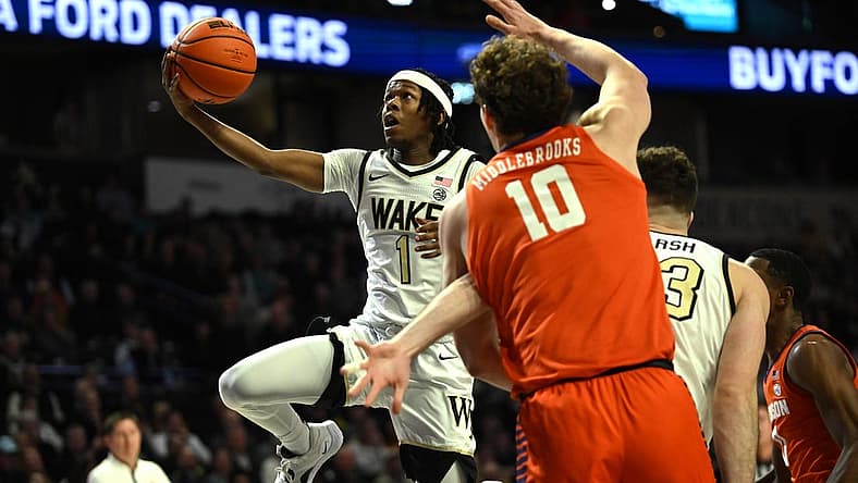 Jan 17, 2023; Winston-Salem, North Carolina, USA; Wake Forest Demon Deacons guard Tyree Appleby (1) goes to the basket past the Clemson Tigers defense during the first half at Lawrence Joel Veterans Memorial Coliseum. Mandatory Credit: William Howard-USA TODAY Sports