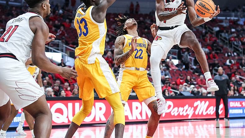 Louisville's Mike James looks to pass around the Pitt defense in the first half at the KFC Center Wednesday night. Jan. 18, 2023
Louisville Vs Pitt Jan 18 2023