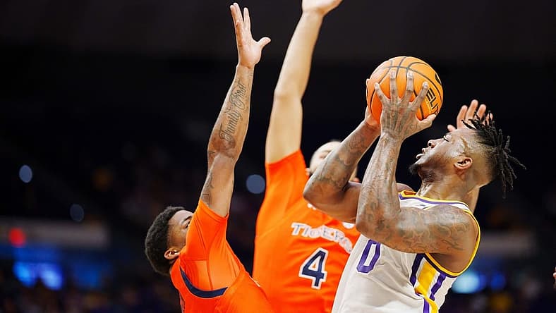 Jan 18, 2023; Baton Rouge, Louisiana, USA; LSU Tigers guard Trae Hannibal (0) shoots the ball against against the Auburn Tigers during the first half at Pete Maravich Assembly Center. Mandatory Credit: Andrew Wevers-USA TODAY Sports