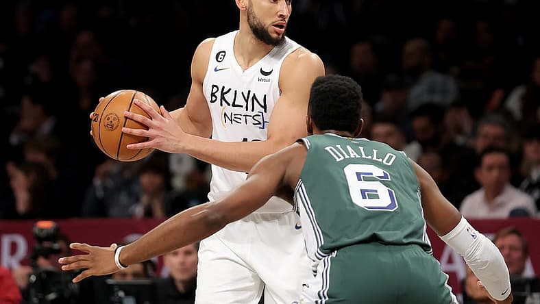Jan 26, 2023; Brooklyn, New York, USA; Brooklyn Nets guard Ben Simmons (10) controls the ball against Detroit Pistons guard Hamidou Diallo (6) during the second quarter at Barclays Center. Mandatory Credit: Brad Penner-USA TODAY Sports