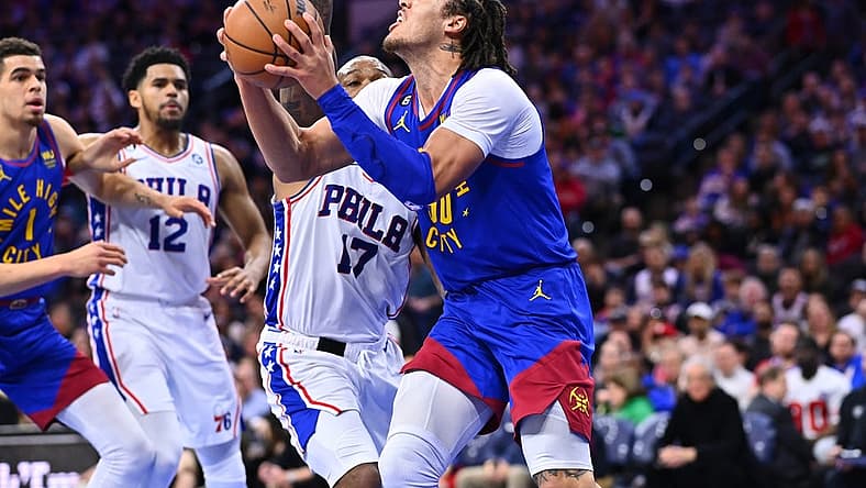Jan 28, 2023; Philadelphia, Pennsylvania, USA; Denver Nuggets forward Aaron Gordon (50) drives against Philadelphia 76ers forward P.J. Tucker (17) in the first quarter at Wells Fargo Center. Mandatory Credit: Kyle Ross-USA TODAY Sports
