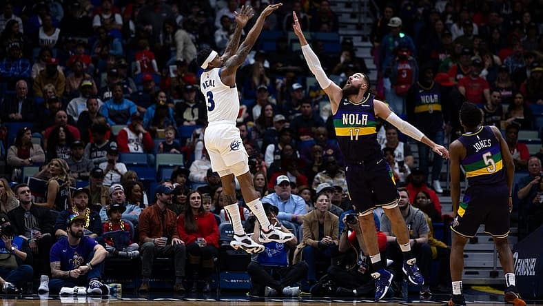 Jan 28, 2023; New Orleans, Louisiana, USA; Washington Wizards guard Bradley Beal (3) shoots a jump shot over New Orleans Pelicans center Jonas Valanciunas (17) during the first half at Smoothie King Center. Mandatory Credit: Stephen Lew-USA TODAY Sports
