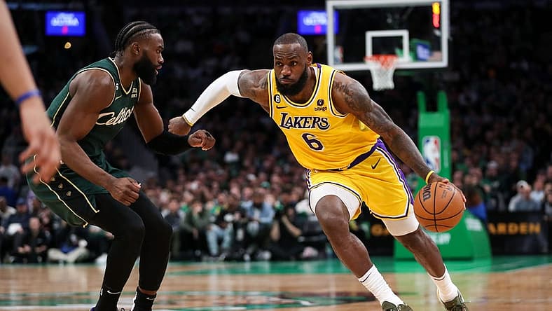 Jan 28, 2023; Boston, Massachusetts, USA; Los Angeles Lakers forward LeBron James (6) drives to the basket defended by Boston Celtics forward Jaylen Brown (7) during the second half at TD Garden. Mandatory Credit: Paul Rutherford-USA TODAY Sports