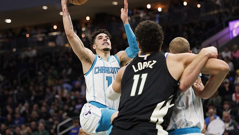 Jan 31, 2023; Milwaukee, Wisconsin, USA; Charlotte Hornets guard LaMelo Ball (1) shoots during the third quarter against the Milwaukee Bucks at Fiserv Forum. Mandatory Credit: Jeff Hanisch-USA TODAY Sports