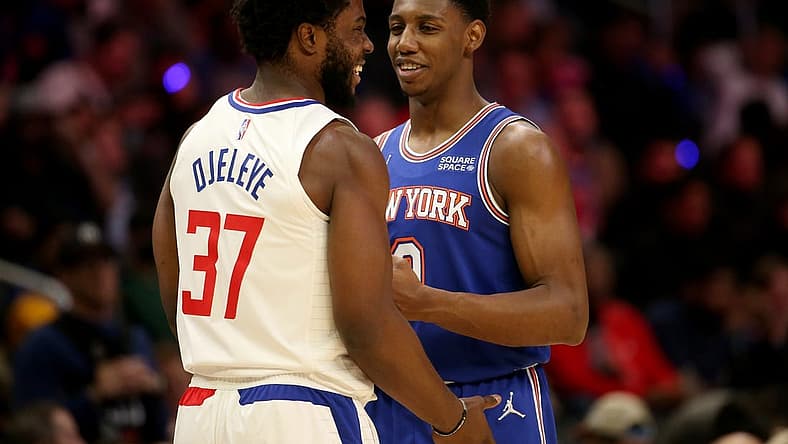 Mar 6, 2022; Los Angeles, California, USA; New York Knicks guard RJ Barrett (9) talks with Los Angeles Clippers forward Semi Ojeleye (37) during the second half at Crypto.com Arena. The Knicks won 116-93. Mandatory Credit: Kiyoshi Mio-USA TODAY Sports